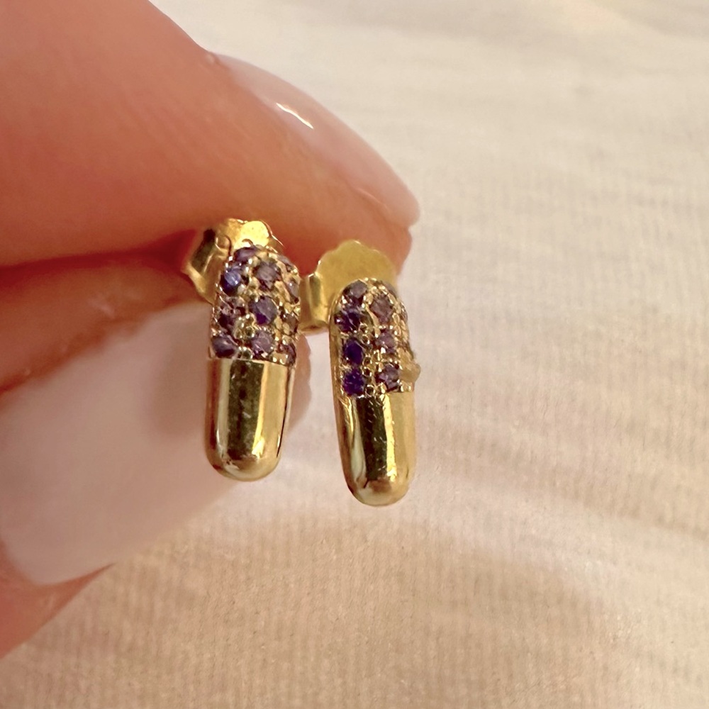 Purple crystal pill studs